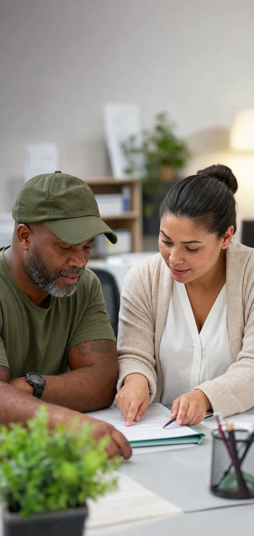 Veteran receiving resource guidance from a community advisor